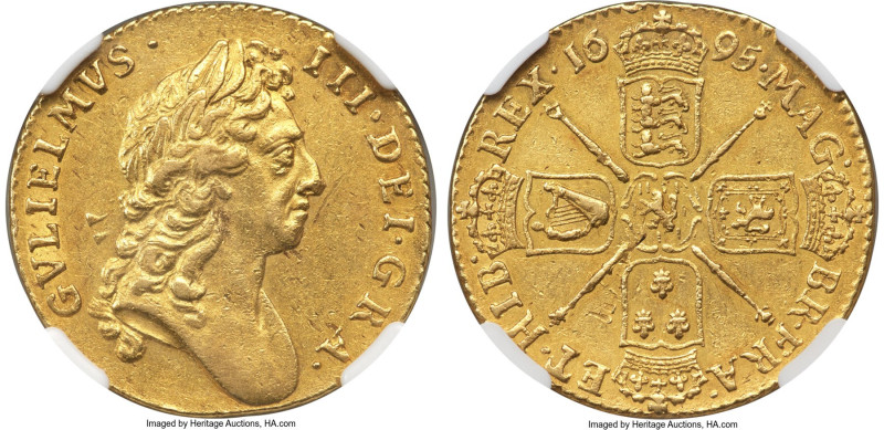 William III gold Guinea 1695 AU55 NGC, KM488.1, S-3458. Lavish amber surfaces su...