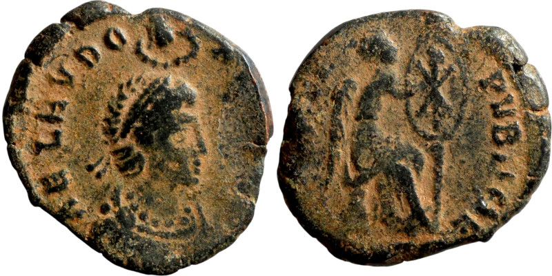 Aelia Eudoxia. (401-403 AD). Follis. Obv: AEL EVDOXIA AVG. Pearl-diademed, drape...