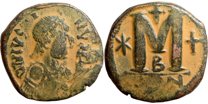 Justin I (518-527) Follis. Obverse: DN IVSTINVS PP AVG diademed, draped, and cui...