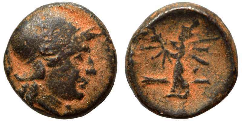 Greek. Ae (bronze, 2.64 g, 13 mm). Helmeted head of Athena right. Rev. Uncertain...