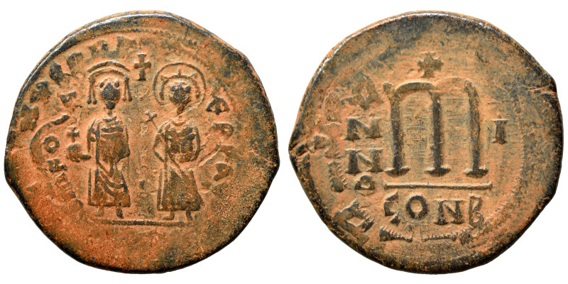 Phocas, with Leontia, 602-610. Follis (bronze, 12.85 g, 31 mm), Constantinople. ...