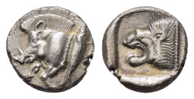 MYSIA. Cyzicos.(Circa 450-400 BC).Obol.

Obv : Forepart of boar left; to right, tunny upward.

Rev : Head of lion left within incuse square.
SNG ...