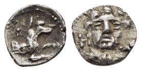 LYCAONIA. Laranda. (4th century BC).Obol.

Obv : Head of Herakles facing.

Rev : Forepart of wolf right; above, star.
Göktürk 68.
EX BIGA.

Co...