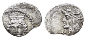 CILICIA. Uncertain.(4th century BC).Obol.

Obv : Female head facing slightly left, wearing stephane; rose to left.

Rev : Male head left, wearing ...