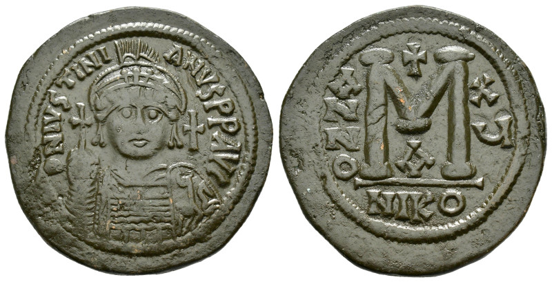 JUSTINIAN I.(527-565).Cyzikos.Follis.

Obv : D N IVSTINIANVS P P AVG.
Helmete...