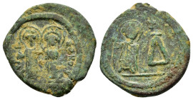 MAURICE TIBERIUS with CONSTANTIA and THEODOSIUS.(582-602).Cherson.Pentanummia.

Obv : d N maVRIC PP AG.
Maurice, holding globus cruciger, and Const...