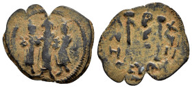 HERACLIUS with HERACLIUS CONSTANTINE and MARTINA.(610-641).Cyprus.Follis.

Obv : Martina, Heraclius and Heraclius Constantine standing facing, each ...