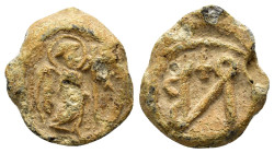 EARLY BYZANTINE SEAL of BONOS with AN ARCHANGEL.(6th Century).Pb.

Obv : Archangel nimbate and winged, moving to right, holding a long sceptre.

R...