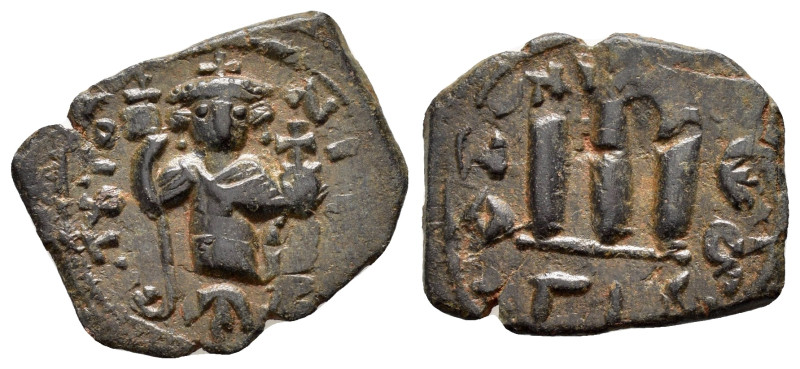 ARAB BYZANTINE.imitating the types of Constans II.Uncertain.(640-650).Fals.

O...