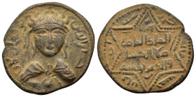 ARTUQID of MARDIN.Husam al-Din Yuluq Arslan.(1184-1200).AH 582.Dirhem.

Obv : حسام الدين يو ـ لق بن ايل غازي.
Diademed and draped facing bust, with...