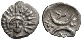 GREEK COINAGE 
 Rubi 
 Obol circa 333-330 BC, AR 0.27 g. Head of Helios facing. Rev. Two crescents interspersed with four pellets and letters. SNG A...