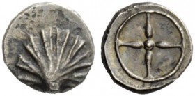 GREEK COINAGE 
 Calabria, Tarentum 
 Litra circa 480-470 BC, Æ 0.53 g. Shell. Rev. Four-spoked wheel. Vlasto 1108-1111. Historia Numorum Italy 835....