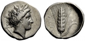 GREEK COINAGE 
 Metapontum 
 Nomos circa 340-330 BC, AR 7.77 g. Diademed head of Demeter r., wearing triple pendant earring and necklace; in l. fiel...
