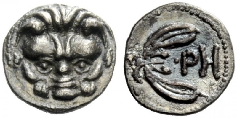 GREEK COINAGE 
 Rhegium 
 Obol circa 415/410-387 BC, AR 0.69 g. Lion mask. Rev...