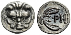 GREEK COINAGE 
 Rhegium 
 Obol circa 415/410-387 BC, AR 0.69 g. Lion mask. Rev. PH and olive sprig. Herzfelder pl. XI, J. Historia Numorum Italy 249...