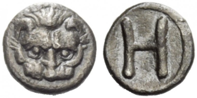 GREEK COINAGE 
 Rhegium 
 Hemiobol circa 415/410-387 BC, AR 0.29 g. Lion mask....