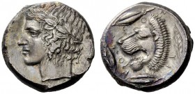 GREEK COINAGE 
 Leontini 
 Tetradrachm circa 430-425 BC, AR 17.13 g. Laureate head of Apollo l. Rev. Head of lion l. with open jaws; around, three b...