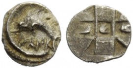 GREEK COINAGE 
 Messana 
 As Zankle. Hemiobol circa 500 BC, AR 0.09 g. Dolphin swimming l within sickle-shaped harbour. Rev. Shell at centre of patt...