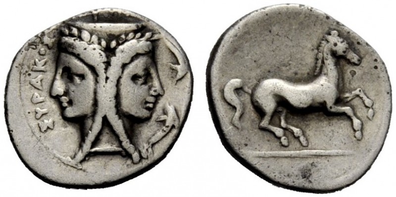 GREEK COINAGE 
 Syracuse 
 2 litrae circa 344-317 BC, AR 1.56 g. Janiform fema...