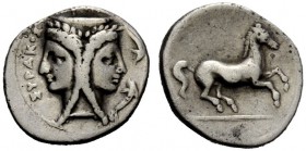 GREEK COINAGE 
 Syracuse 
 2 litrae circa 344-317 BC, AR 1.56 g. Janiform female head; in r. field, two dolphins. Rev. Horse prancing r. SNG Copenha...