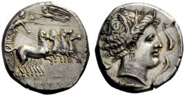 GREEK COINAGE 
 The Carthaginians in Italy and Sicily 
 Tetradrachm, Panormus (?) circa 330-305 BC, AR 17.08 g. Charioteer driving fast quadriga r.;...