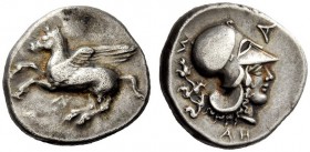 GREEK COINAGE 
 Epirus, Ambrakia 
 Stater circa 404-360 BC, AR 8.57 g. Pegasus flying l. Rev. Head of Athena r., wearing Corinthian helmet; in r. fi...