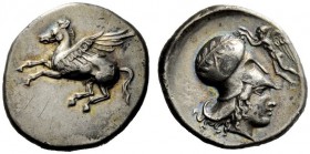 GREEK COINAGE 
 Epirus, Ambrakia 
 Stater circa 404-360 BC, AR 8.47 g. Pegasus flying l. Rev. Head of Athena r., wearing Corinthian helmet decorated...