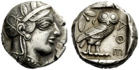 GREEK COINAGE 
 Attica, Athens 
 Tetradrachm after 449 BC, AR 17.17 g. Head of Athena r., wearing Attic helmet decorated with olive leaves and palme...
