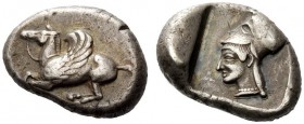 GREEK COINAGE 
 Corinthia, Corinth 
 Stater circa 515-475 BC, AR 8.36 g. Pegasus flying l. Rev. Head of Athena l., wearing Corinthian helmet. Within...