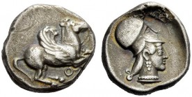 GREEK COINAGE 
 Corinthia, Corinth 
 Stater circa 450-415 BC, AR 8.47 g. Pegasus flying r. Rev. Head of Athena r., wearing Corinthian helmet. Within...