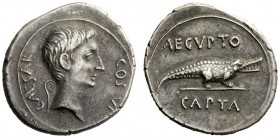 THE ROMAN EMPIRE 
 Octavian, 32-27 BC 
 Denarius, Brundisium or Roma (?) circa 29-27, AR 4.01 g. Bare head r.; behind, lituus. Rev. Crocodile advanc...