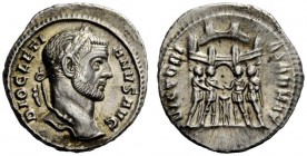 THE ROMAN EMPIRE 
 Diocletian, 284 – 305 
 Argenteus circa 294, AR 3.16 g. Laureate head r. Rev. Six-turreted camp gate with the four tetrarchs swea...