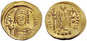 THE BYZANTINE EMPIRE 
 Justinian I, 527 – 565 
 Solidus 527-538, AV 4.47 g. Helmeted, diademed and cuirassed bust facing, holding globus cruciger an...