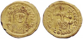 THE BYZANTINE EMPIRE 
 Justin II, 565 – 578 
 Solidus 565-578, AV 4.39 g. Helmeted and cuirassed bust facing, holding globe surmounted by Victory an...