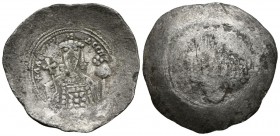 ALEXIUS I COMMENUS. Aspron Trachy. 1092-1118 d.C. Constantinopolis. A/ Cristo en trono de frente, vistiendo Palio y colobio, sosteniendo evangelios en...
