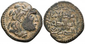 ARTUQIDS DE MARDIN. Alpi. Dirham. 1152-1176. Busto tipo Seleucida con el nombre Najm al-din grabado en el cuello. S&S Type 27; Album 1827.2. Ae. 13,87...