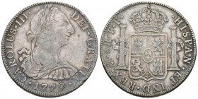 CARLOS III. 8 Reales. 1779. México FF. Acuñada sobre otro real de a 8. Cal-929. Ar. 26,82g. Bonita pátina irisada. MBC. Escasa.