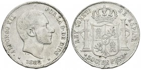 ALFONSO XII. 50 Centavos de Peso. 1882. Manila. Cal-82. Ar. 12,98g. Golpes en el canto. MBC.