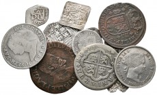 MONARQUIA ESPAÑOLA. Lote compuesto por 12 monedas, la mayoría de plata. Conteniendo 1 Dirham Almohade; 1 Dirham del Reino de Granada; Felipe II. 1/2 R...
