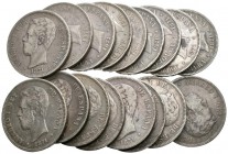 AMADEO I. Lote compuesto por 18 monedas de 5 Pesetas conteniendo: 1871 *18-71. SDM (13); *18-74. DEM (3); *18-75. DEM. Ar. MBC/BC-. A EXAMINAR.