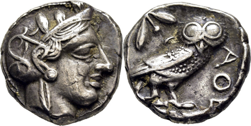 ÁTICA-ATENAS. Tetradracma. 403-365 a.C. Cabeza de Atenea a derecha con casco ado...