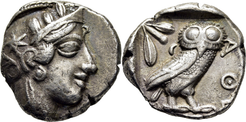 ÁTICA-ATENAS. Tetradracma. 480-407 a.C. Cabeza de Atenea a derecha con casco ado...