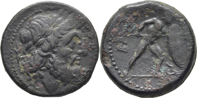 BRUTTIUM-BRETTIA. AE 22. 214-211 a.C. Cabeza de Zeus laureada a derecha, detrás ...