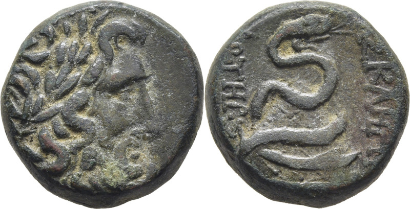 MYSIA-PERGAMON. AE 18. 200-213 a.C. Cabeza de Zeus a derecha. Bastón con serpien...