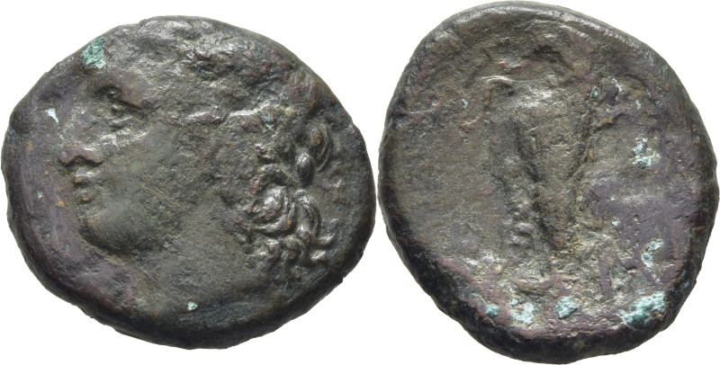 SICILIA-SIRACUSA. AE 22. 344-336 a.C. Cabeza de Zeus Hellanios a izquierda. Águi...
