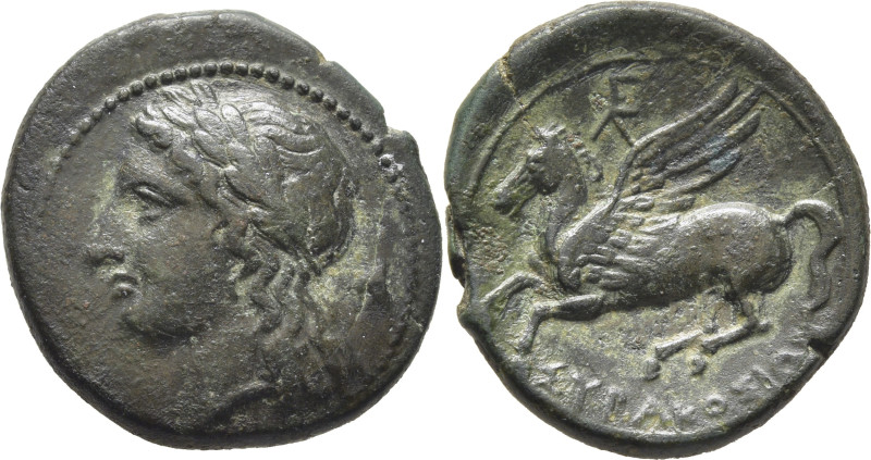 SICILIA-SIRACUSA. AE 19. 344-317 a.C. Cabeza laureada de Apolo a izquierda, AY t...