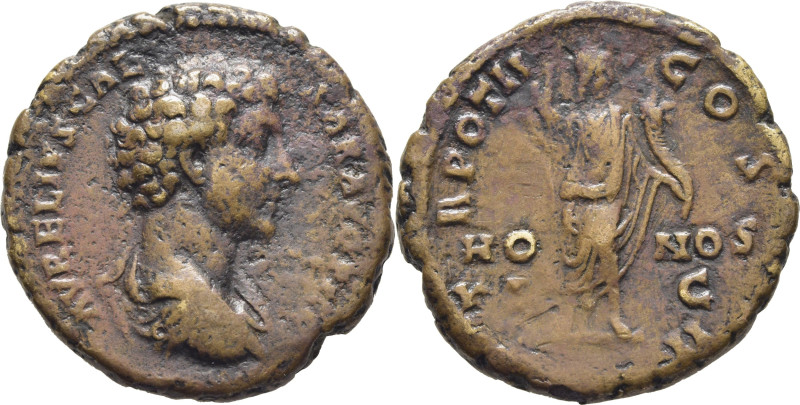 ROMA IMPERIO. Marco Aurelio. Dupondio. 145. Busto drapeado a derecha, alrededor ...