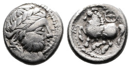 Eastern Celtic Tribes, imitating imitations of Philip II of Macedon, circa 2nd.-1st. Century BC. AR Drachm (14 mm, 2,86 g.). 'Kugelwange' type. Laurea...