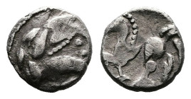 Middle Danube Tribes, AR Obol (8mm, 0,50g.). 'Kapostaler' type 2nd.-1st. Century. Celticized head of laureate Zeus to right. Rev. Horse galloping to l...