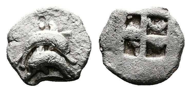 Islands off Thrace, Thasos. Circa 500-480 BC. AR Obol (8 mm. 0,32 g). Two dolphi...